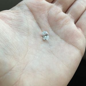 One carat Moissanite. Selling as is. Stone only. No paperwork.